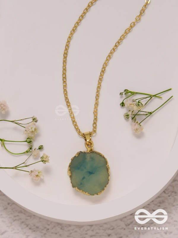 The Oceanic Bloom - Golden And Blue Resin Pendant With Anti-Tarnish Coating