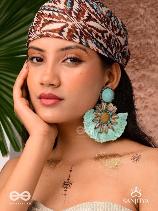 Vibhusitpuspa - the adorned flower - embroidered flower earrings with turquoise tassles
