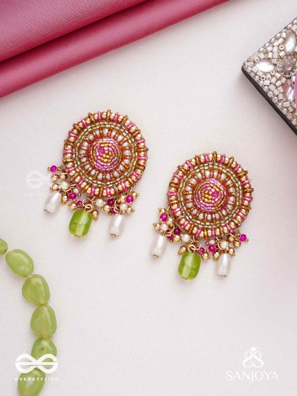 Māṇikyamāṇḍala- Gem Mandala-Circular motifs embellished with pink and golden accents, beads, and stones