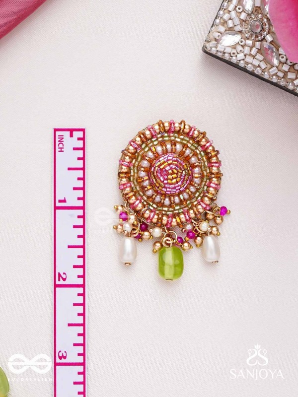 Māṇikyamāṇḍala- Gem Mandala-Circular motifs embellished with pink and golden accents, beads, and stones