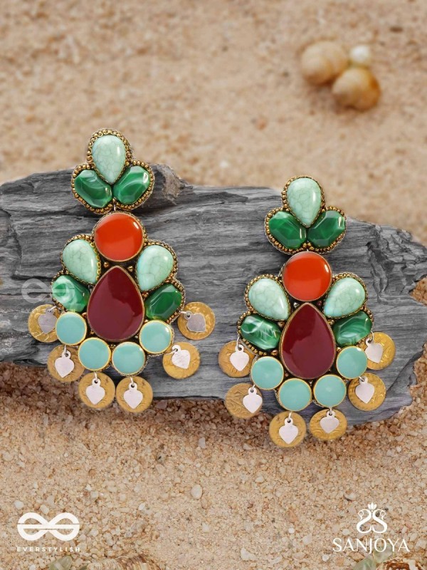 Vikṛtiśīla- Elegant Form-Chunky blue, green, and rust-colored stones with a distinctive golden-silver leaflet design
