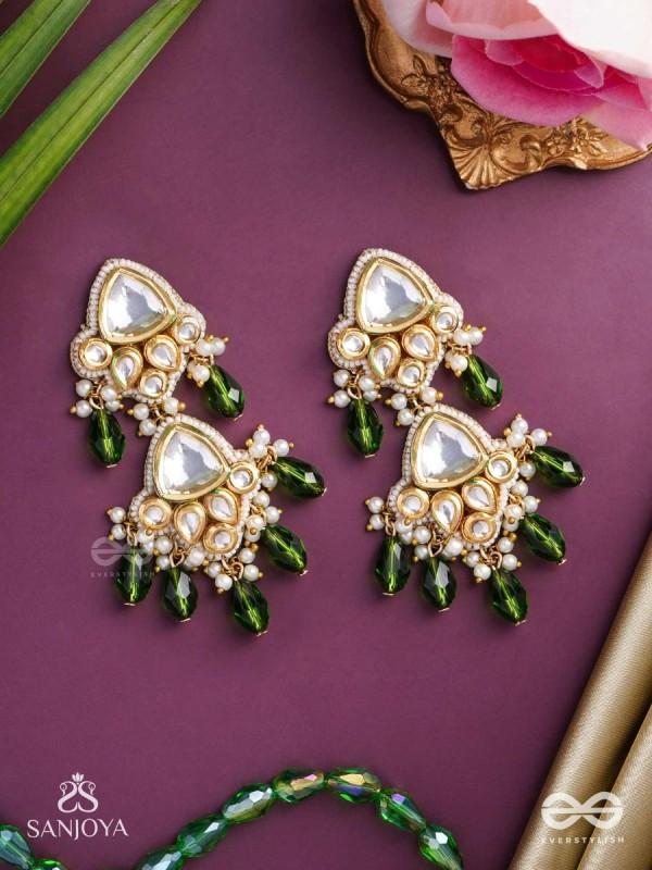 Kundalāṅgī-Kundan Elegance- Traditional pearl and Kundan earrings adorned with beads, stones, and green danglers for a regal touch.