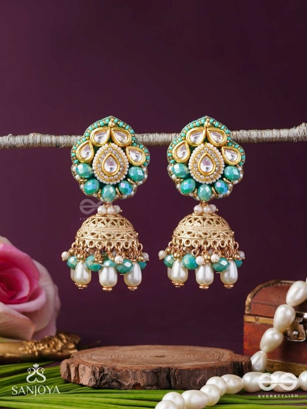 Sphārikā- Crystal Radiance-Jhumka earrings adorned with diamond shaped stones,beads and pearls of golden, white and turquoise accents