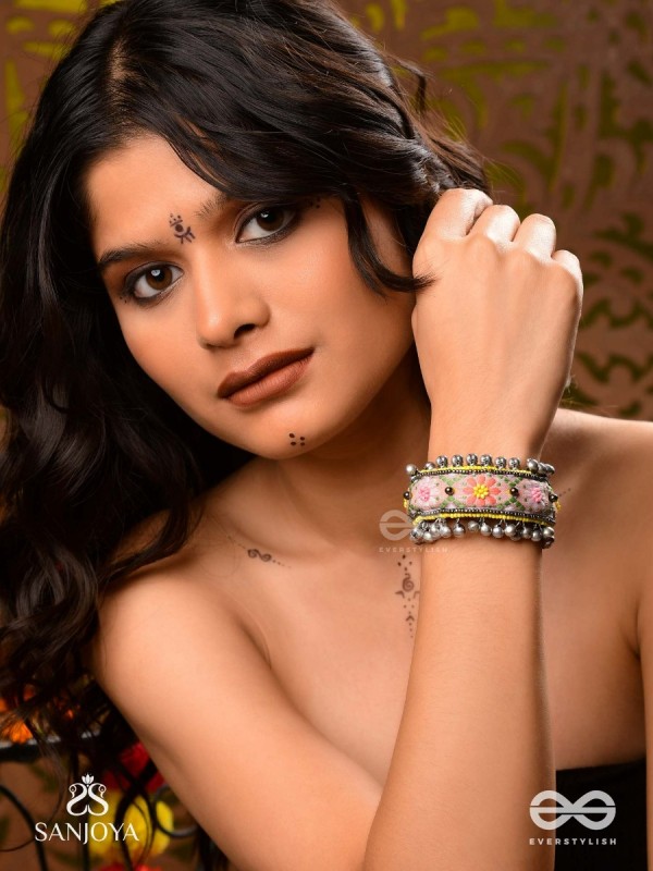 SUMANALEKHA-FLORAL PATTERN- SEMI-OXIDIZED BRACELET FEATURES GHUNGROO, BEADS, AND EMBROIDERED FLOWERS