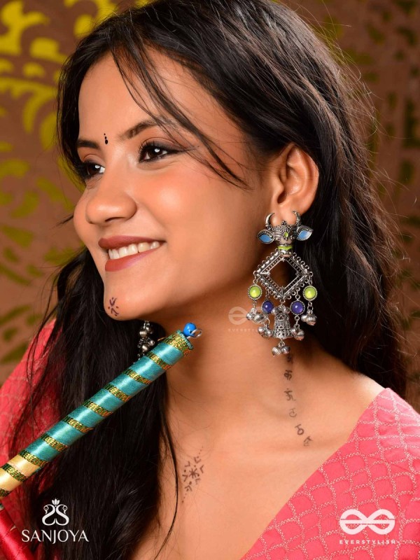 NANDI MANIKARNA- NANDI STONE EARRINGS-OXIDIZED EARRINGS FEATURING A BULL FACE, ADORNED WITH STONES AND GHUNGHROOS