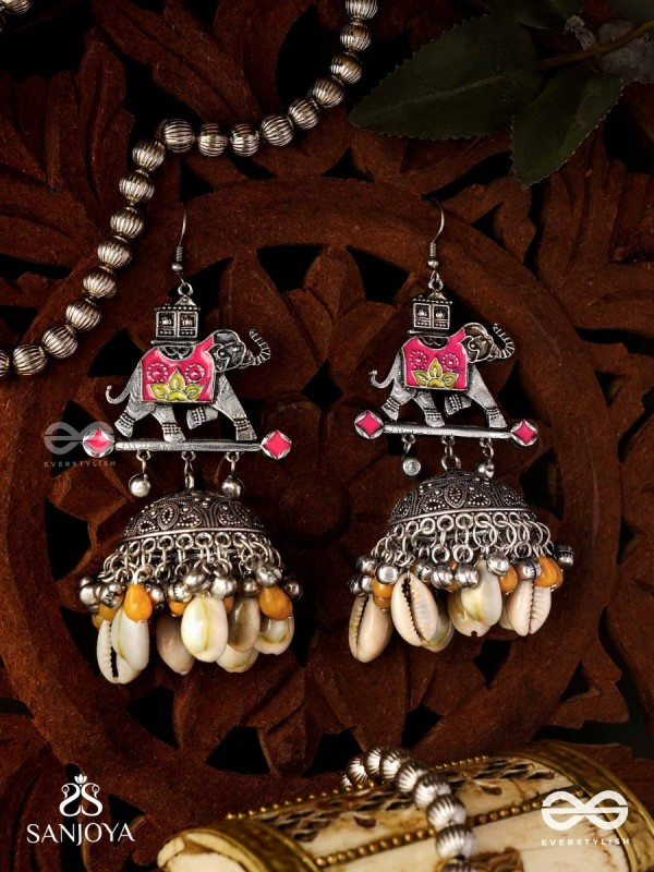 GAJASANKHA KARṆIKA- ELEPHANT-SHELL EARRINGS- OXIDIZED EARRINGS FEATURING AN ELEGANT MOTIF, DELICATE GHUNGHROO'S, AND COWRIE SHELLS