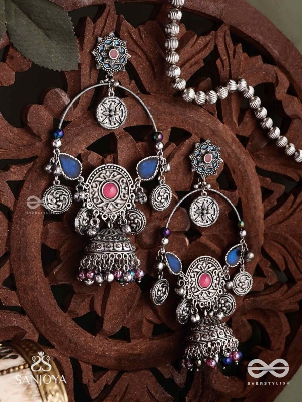 SHUBHRAVILASA- RADIANT GRACE- SILVER TONED EARRINGS, CIRCULAR MOTIFS ADORNED WITH GHUNGROOS AND JHUMKA
