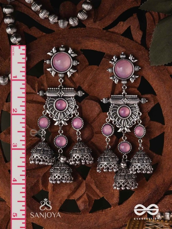 VIJAYAMUKTA-VICTORY PEARLS- REGAL OXIDIZED EARRINGS WITH A CENTRAL PURPLE STONE AND LAYERED JHUMKAS