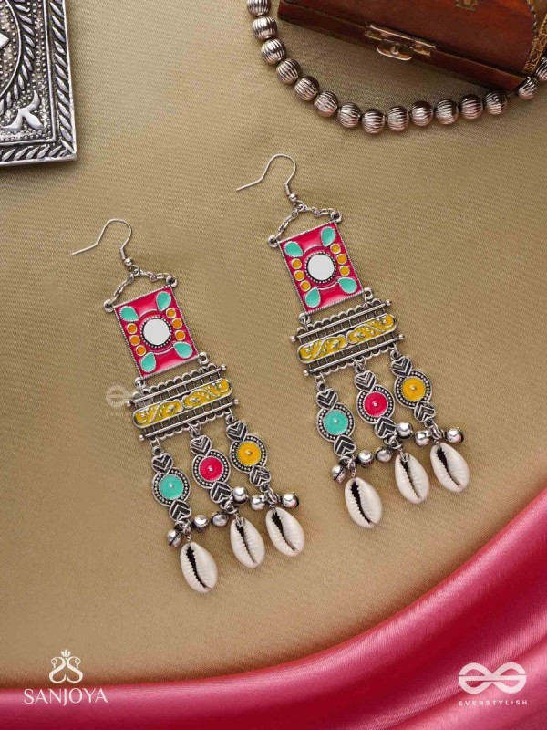 SINGHASANAMUKTA- THRONE GEM- OXIDIZED ENAMELLED EARRINGS IN MULTICOLOUR MOTIFS WITH GHUNGHROO'S AND COWRIE SHELLS