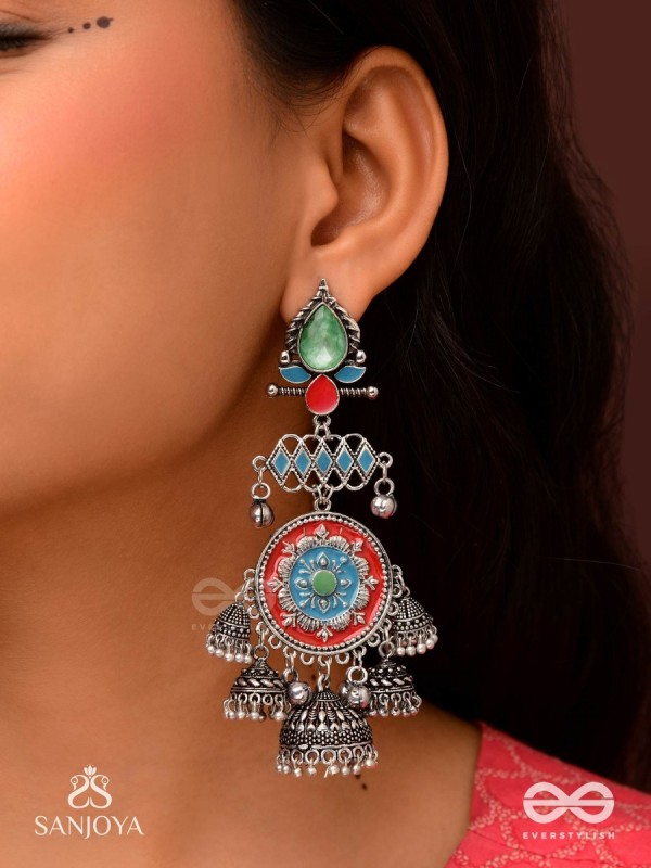  ADITYARATNA-SUN GEM- RADIANT EARRINGS WITH DETAILED METALWORK SET IN PASTEL TONE FEATURING STONE AND JHUMKAS