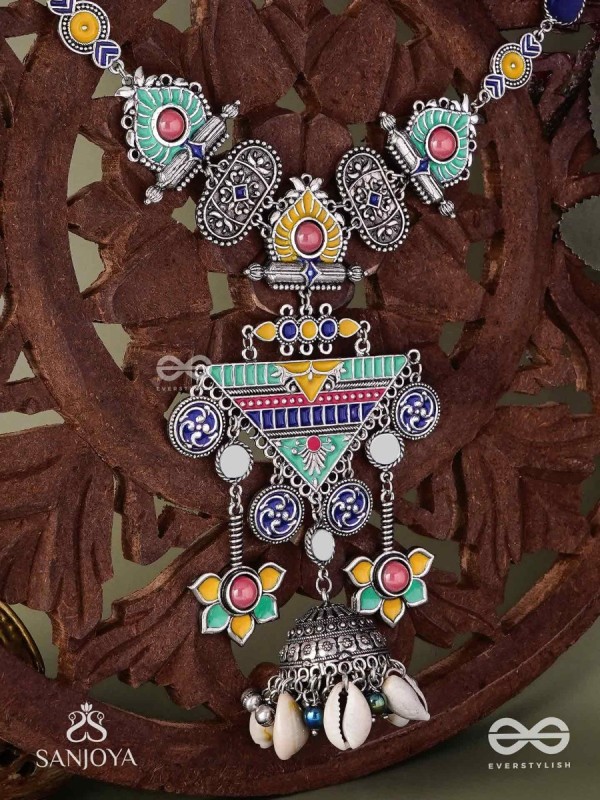 Rangapadma-Color bloom- Enamelled Neckpiece with cowrie shells,mirror and colorful gemstones on oxidized metalwork.