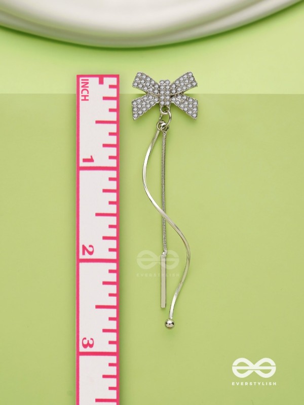 Starry Knots- Dangling Silver Cubic Zirconia Earrings 