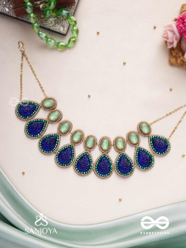 JALANEELINI - WATER LIKE BLUE ELEGANCE - BLUE TEARDROP SHAPES, GEMSTONES WITH GOLDEN EBELLISHED NECKLACE