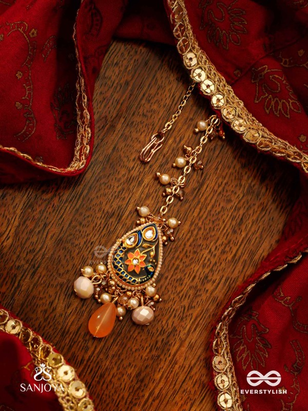 SANDHYAPRIYA - LOVER OF DUSK - EXQUISITE GOLDEN ENAMELLED KUNDAN MAANGTIKA WITH LUSTROUS ORANGE GEM DROPS