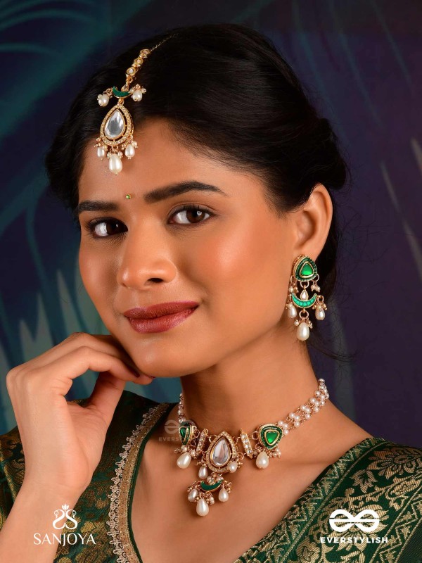 RATNODYA - RISING GEM - DAZZLING KUNDAN MAANGTIKA WITH PEARLS AND ROYAL GREEN AND GOLD ACCENTS