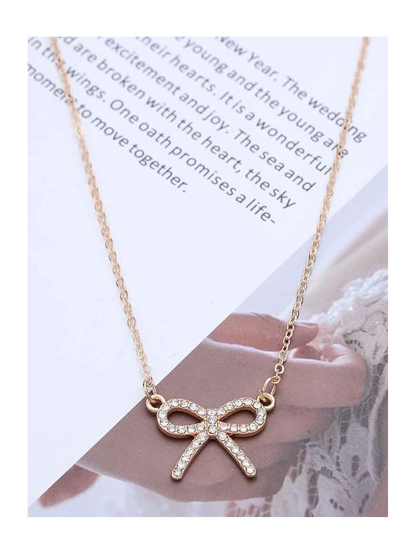 TIED IN GOLD- MINIMALIST BOW NECKPIECE