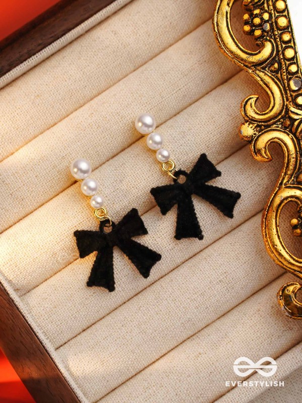 MIDNIGHT BOW - CHIC BLACK BOW WITH PEARL ACCENTS