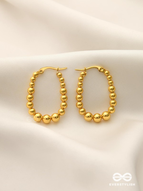 SUNBURST HOOPS – DELICATE DROP-SHAPED STAINLESS STEEL EARRINGS