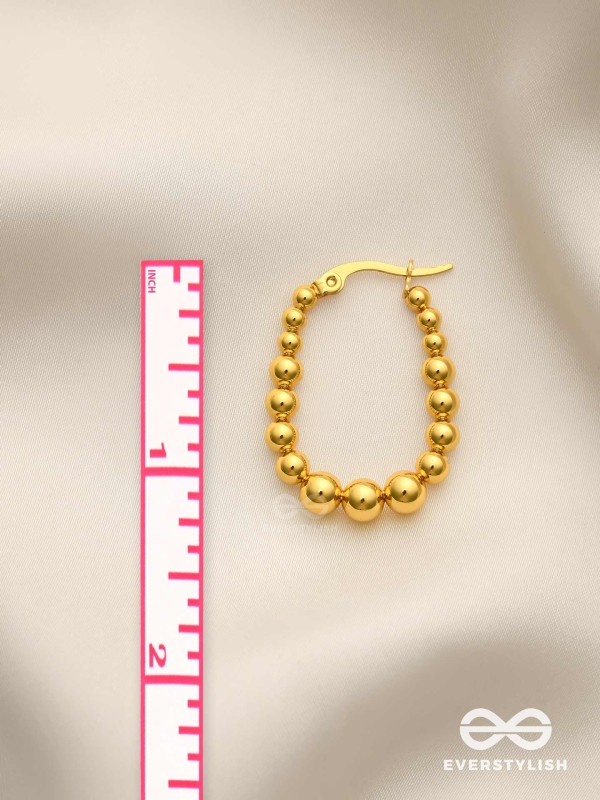 SUNBURST HOOPS – DELICATE DROP-SHAPED STAINLESS STEEL EARRINGS