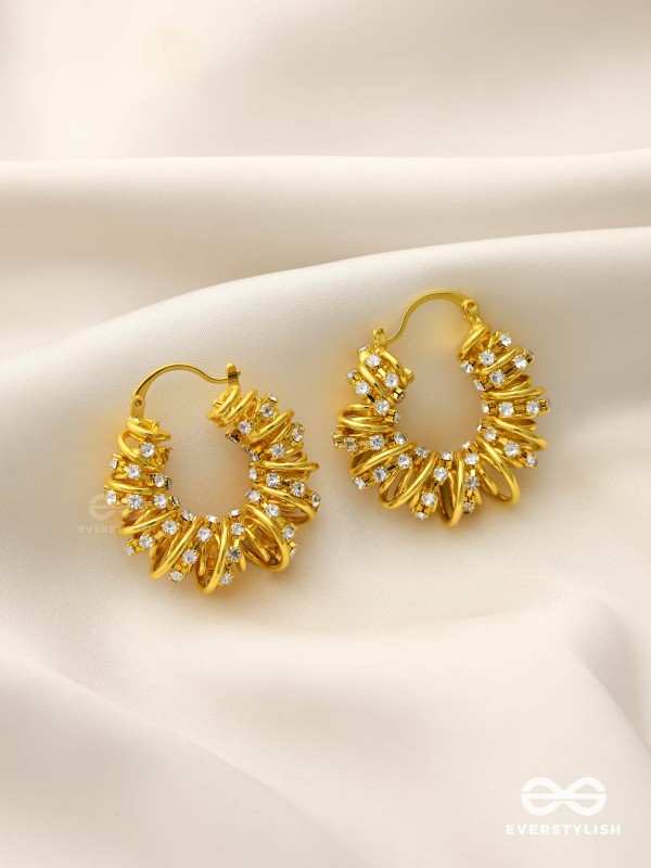 LUSTROUS SWIRLS-  INTRICATE TWISTED GOLD EARRINGS WITH SHIMMERING STONE
