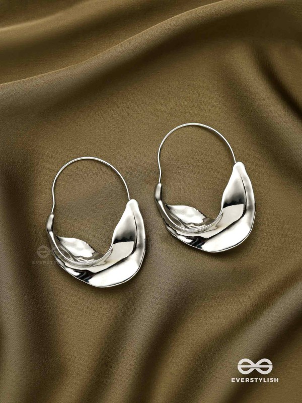 SILVER DRIFT- SCULPTED SILVER HOOPS WITH A FLUID