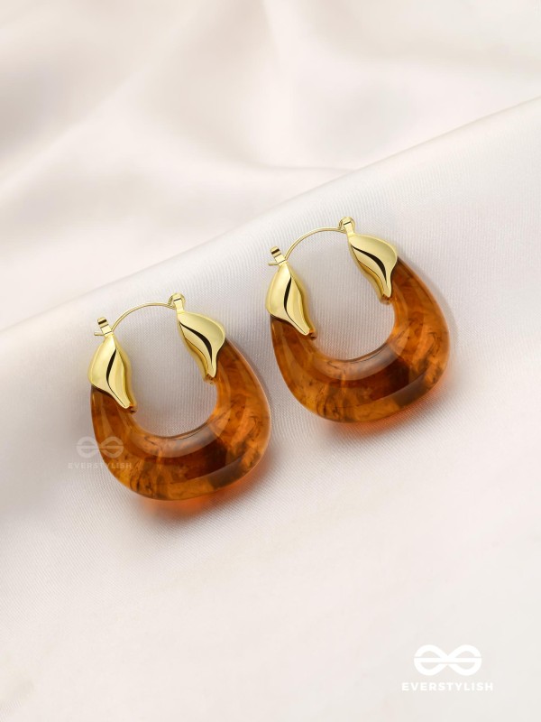 AMBER ARC- RICH BROWN RESIN HOOPS