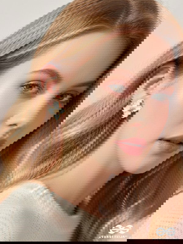 IVORY FLARE- GENTLE OFF-WHITE BLOOM STUDS