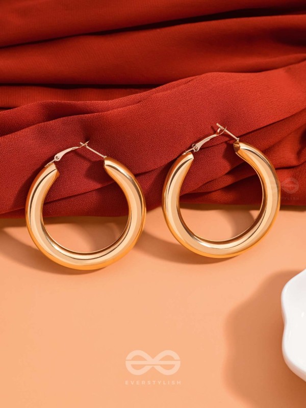 A Fashionista’s Dream - Glittering gold loops