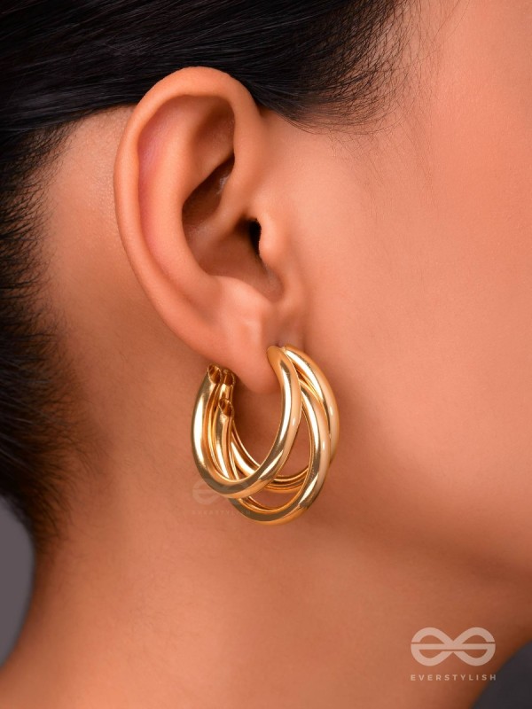 The Elegant Statement Makers - Golden Stud Earrings