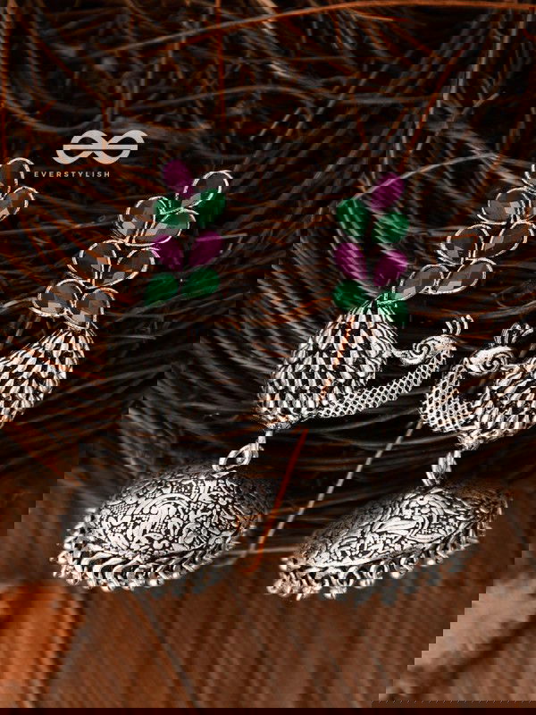 The Dancing Peacocks Engraved Jhumkis (Ruby Emerald) - Embellished Oxidised Collection