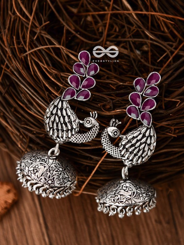 The Dancing Peacocks Engraved Jhumkis (Ruby Red) - Embellished Oxidised Collection