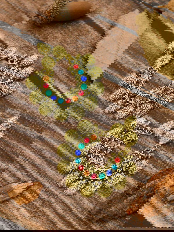 The Intricate Sun - Oxidised Golden Earrings