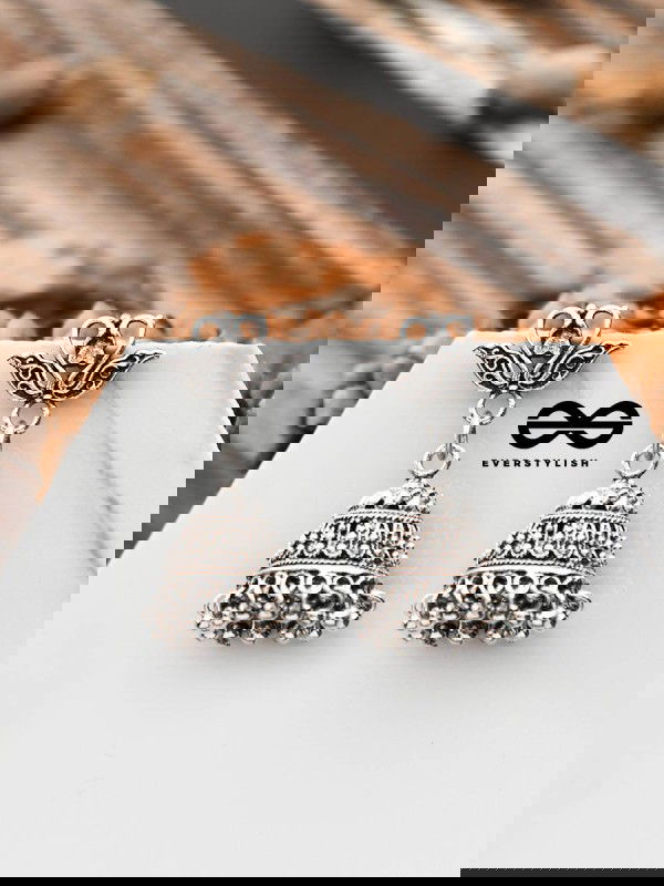 The Oxidised Swan Jhumkis - Tiny Trinket Earrings