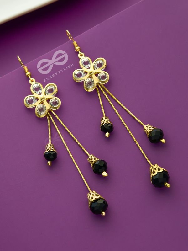 The floral augmented charm- Golden dangler earrings