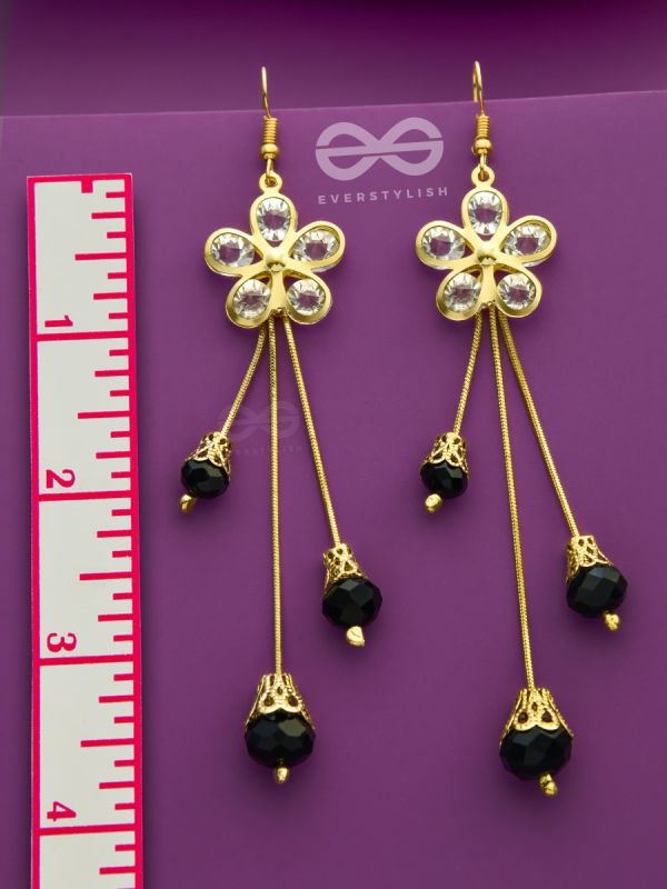 The floral augmented charm- Golden dangler earrings