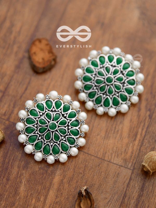The headturner's blissful Emerald-Pearl statement earrings