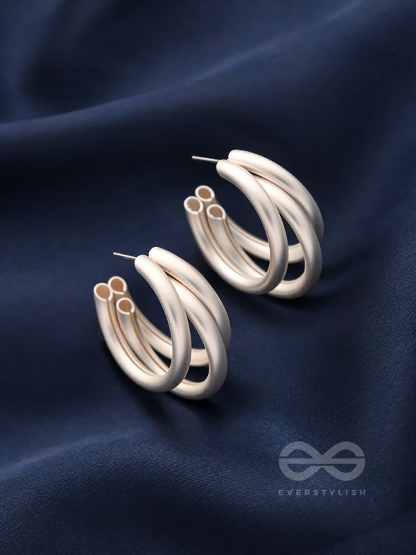 THE ELEGANT TURNS - MATTE FINISHED SILVER HOOPS