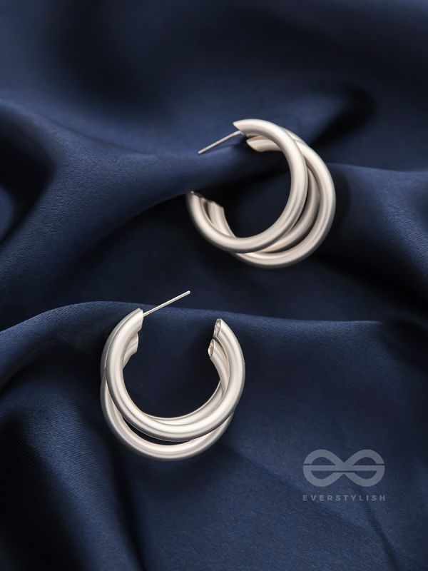 THE ELEGANT TURNS - MATTE FINISHED SILVER HOOPS