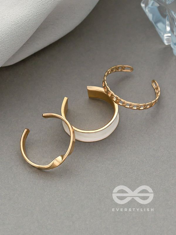 THREE CHEERS- SET OF THREE WHITE AND ROSE GOLD RINGS