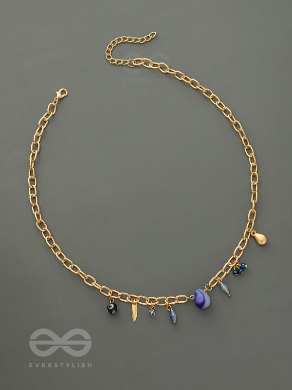 Fragments of the Sky- Blue Crystals Studded Golden Necklace