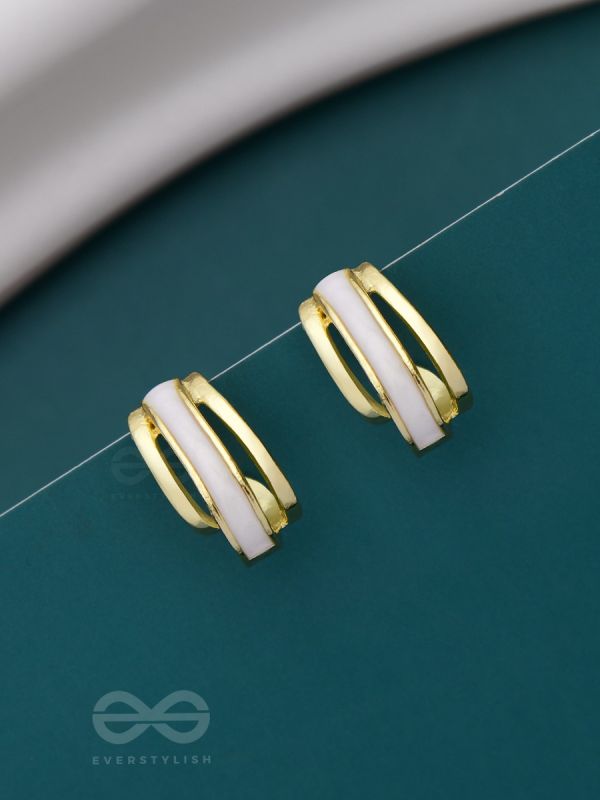 A CLASSY DAME - WHITE ENAMELLED GOLDEN STUDS