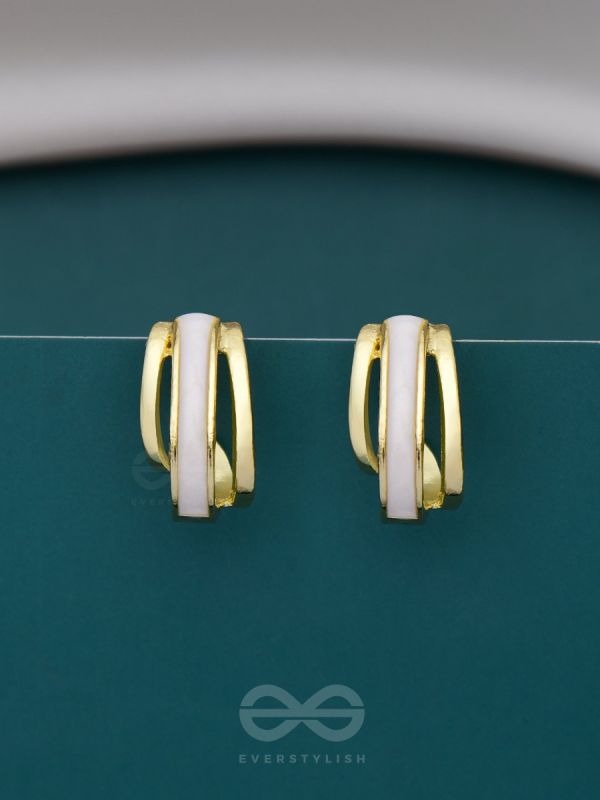 A CLASSY DAME - WHITE ENAMELLED GOLDEN STUDS