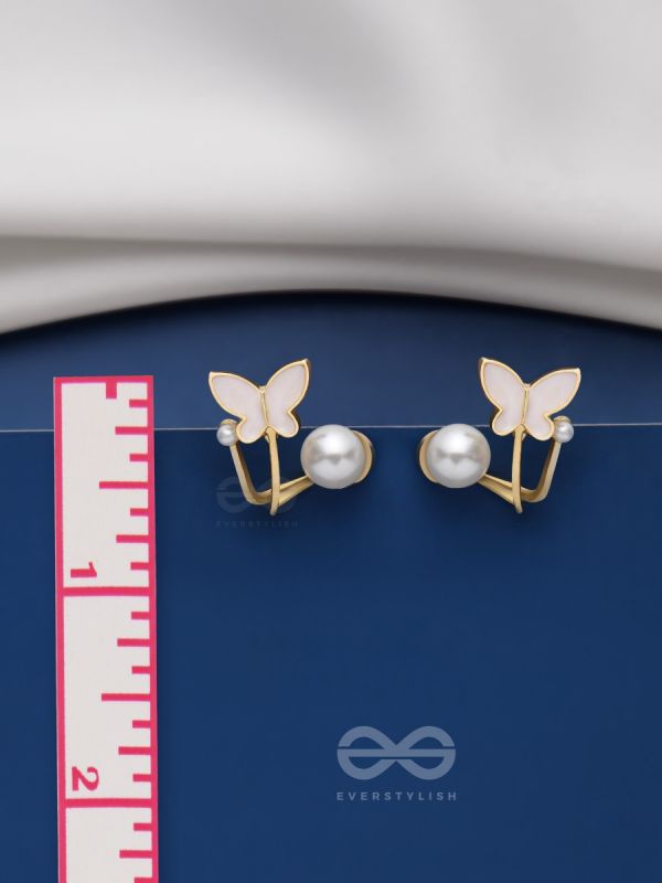 A WINGED WONDER - GOLDEN AND WHITE EAR JACKETS