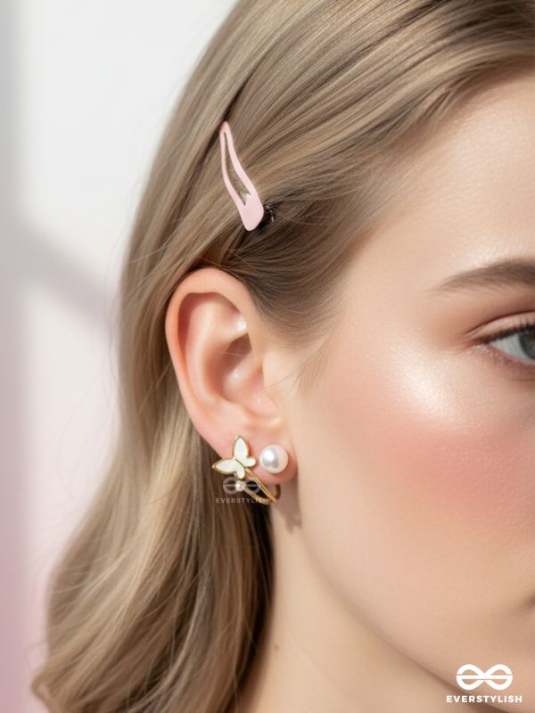 A WINGED WONDER - GOLDEN AND WHITE EAR JACKETS