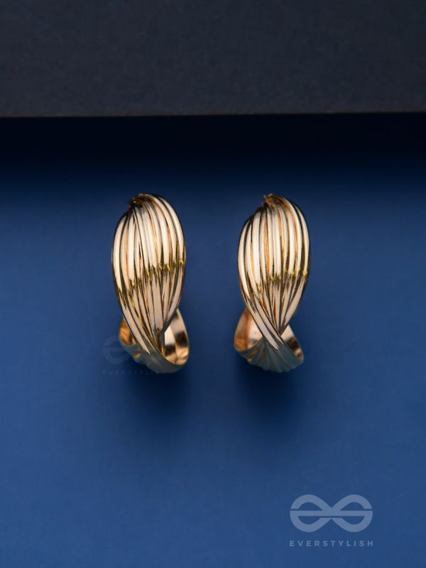 LEVELING IT UP - STATEMENT GOLDEN HOOPS