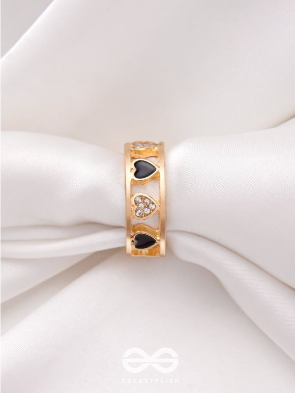 ENVELOPED IN HEARTS - GOLDEN STATEMENT RING (BLACK)