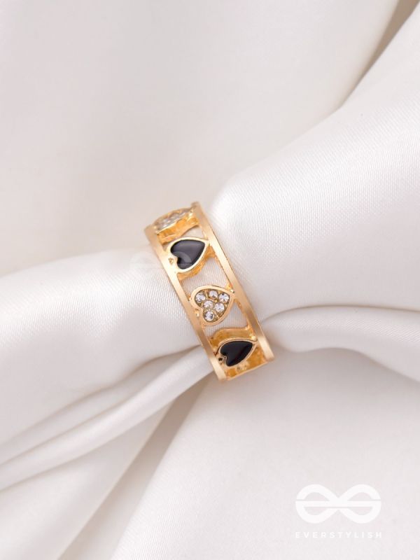ENVELOPED IN HEARTS - GOLDEN STATEMENT RING (BLACK)