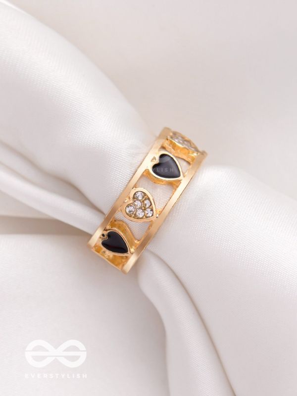 ENVELOPED IN HEARTS - GOLDEN STATEMENT RING (BLACK)