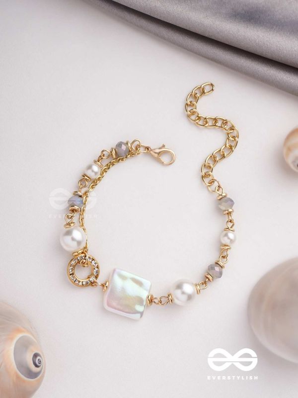 CLASSIC IVORY ALLURE - GOLDEN EMBELLISHED BRACELET WITH ANTI TARNISH COATING 