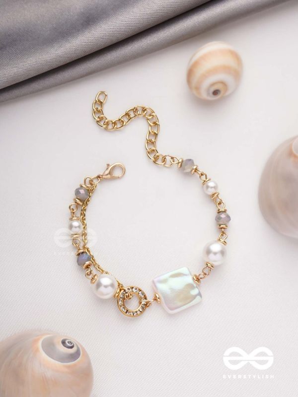 CLASSIC IVORY ALLURE - GOLDEN EMBELLISHED BRACELET WITH ANTI TARNISH COATING 